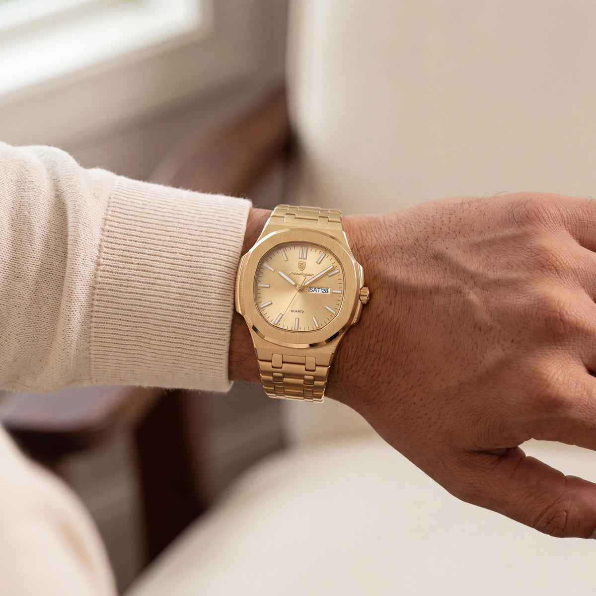 Warm gold, on the wrist.